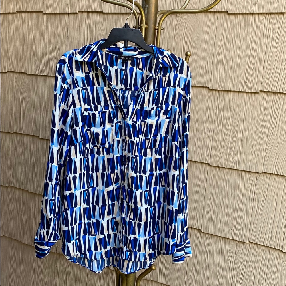 Colorful button down blouse.